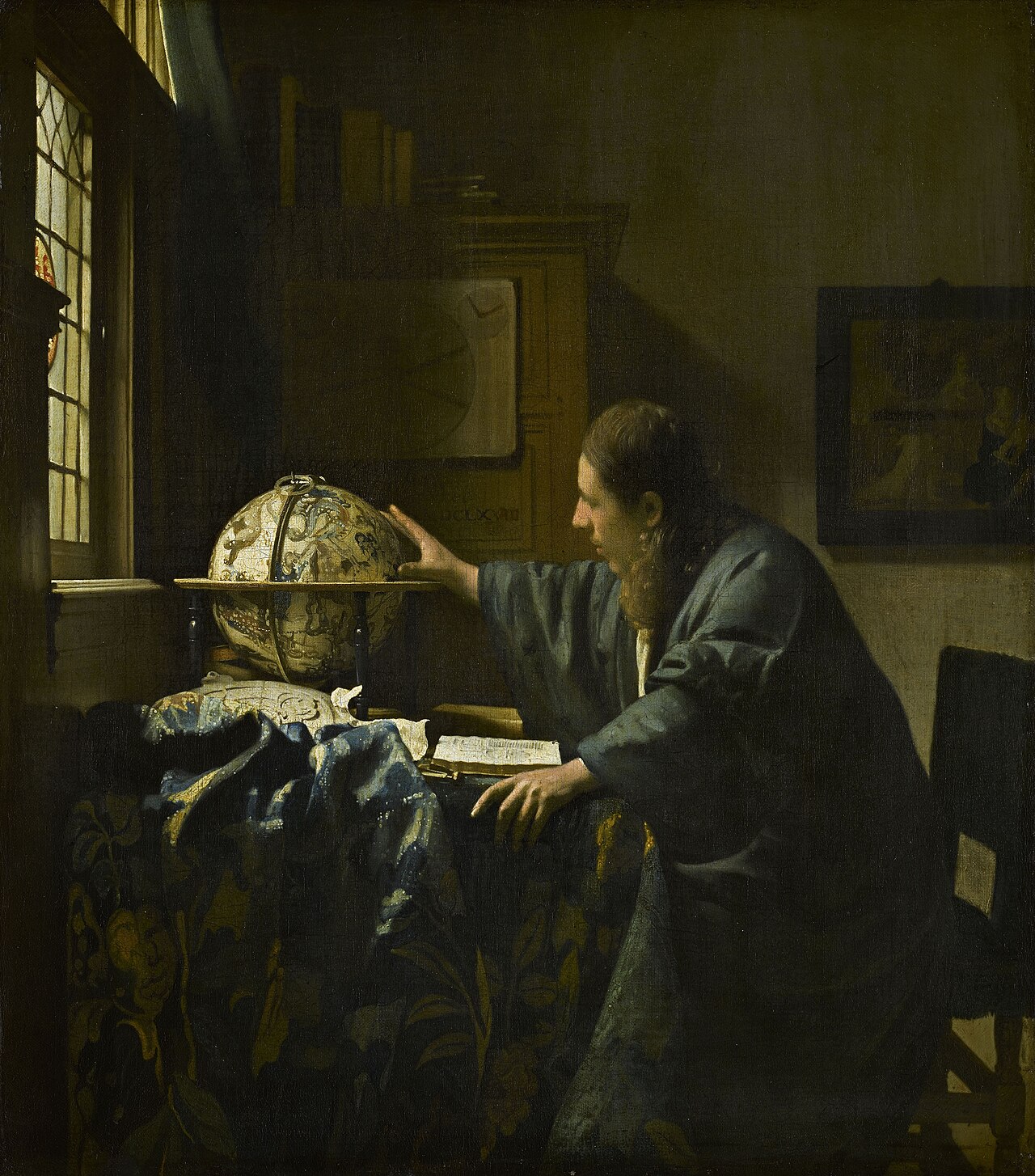 The Astronomer. Johannes Vermeer, c. 1668. A hand on the globe, a question in the air.